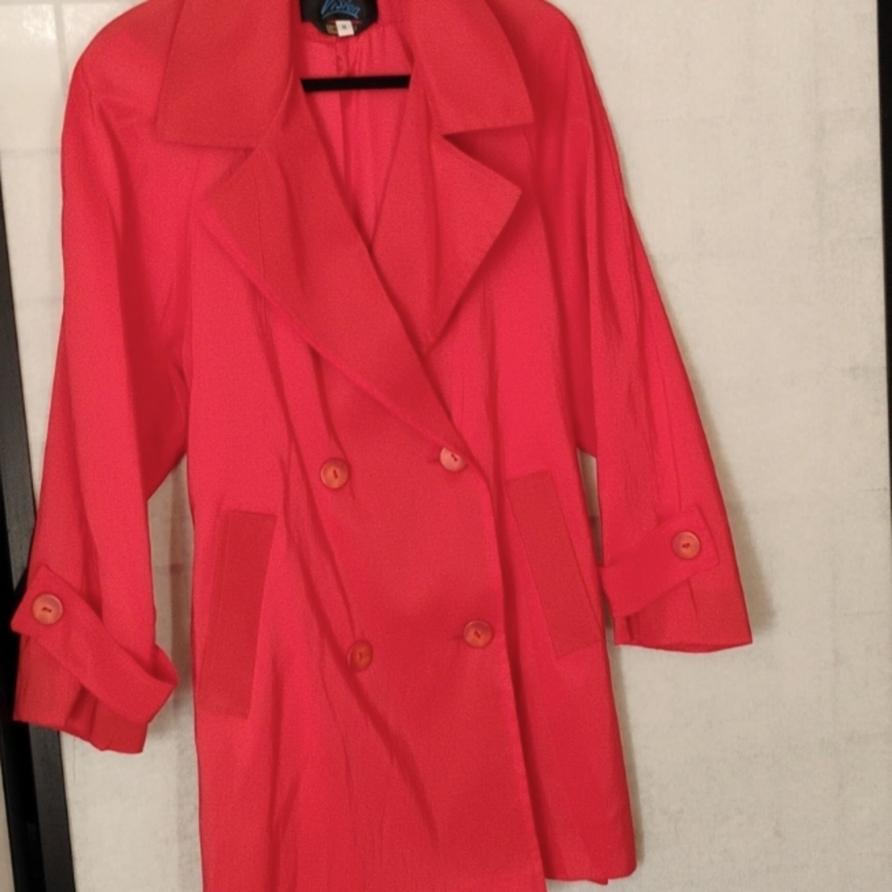 Beautiful Red Trench coat.  Excellent condition Never been worn